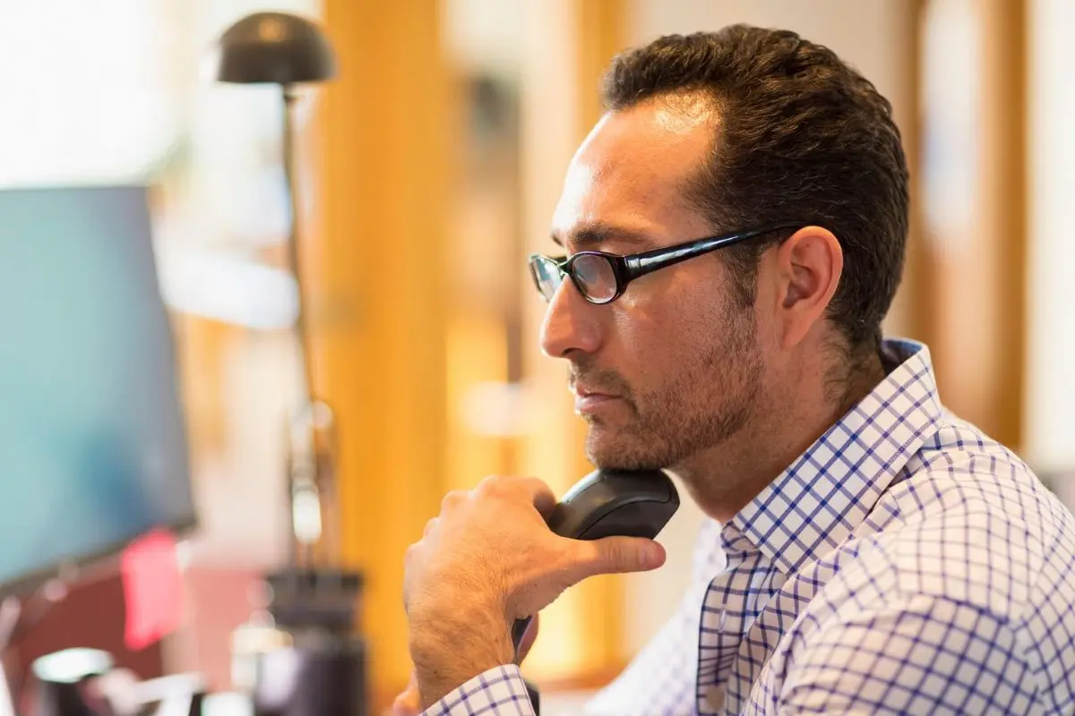 male business owner thinking 